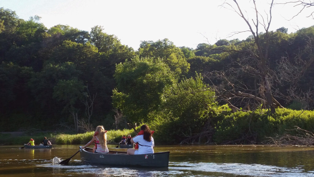 Two women in a canoe on a lake