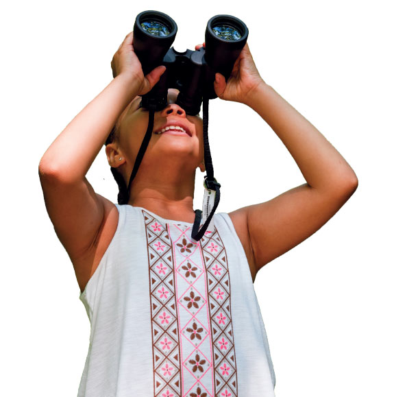 a picture of a young girl looking into the sky with a pair of binoculars