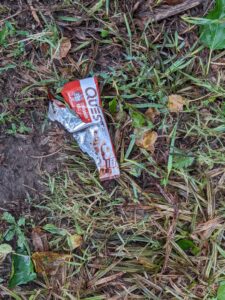 a wrapper on the ground