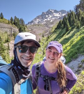 An image of Emily Prauner on a hike with her husband Seth.