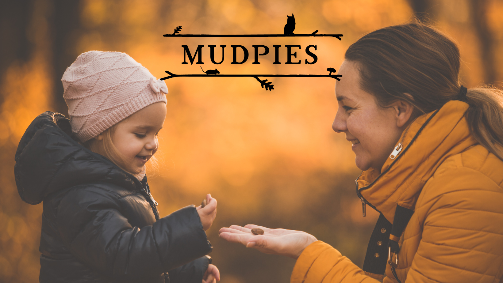 An image of a young girl and her mother smiling at one another overlayed by the Mudpies logo.