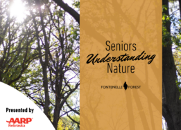 An image of the sun shining through tree branches overlayed by an orange banner displaying the words "Seniors Understanding Nature" underscored by the Fontenelle Forest logo. The lower left corner of the image displays the words "Presented by AARP Nebraska."